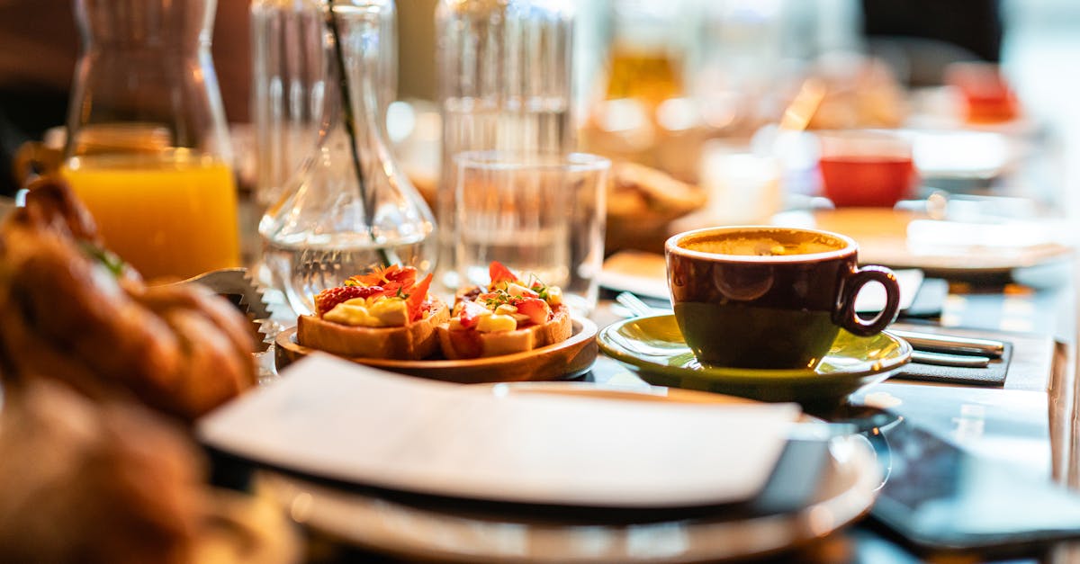 A cozy café breakfast setup featuring coffee and delicious tartines.
